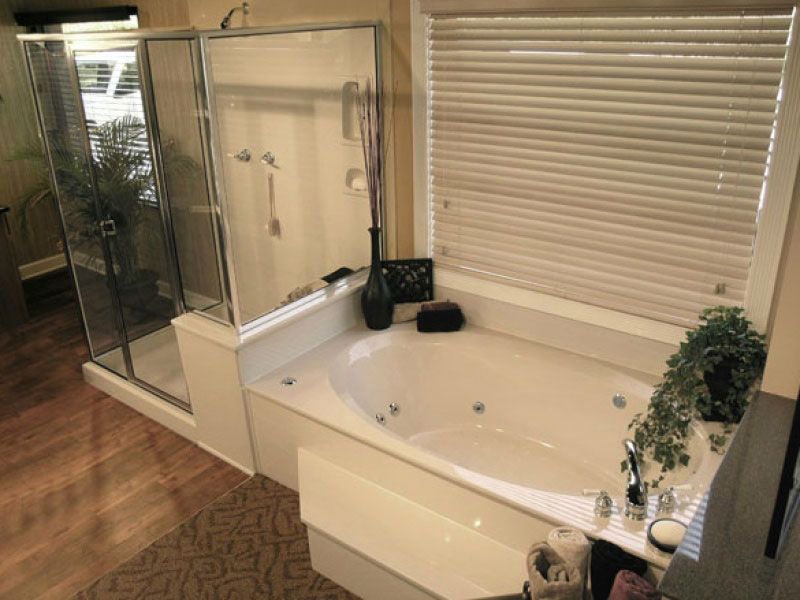 Shower glass door with inset soap dish