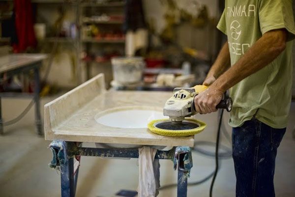 closeup of cast stone buffing and finishing process